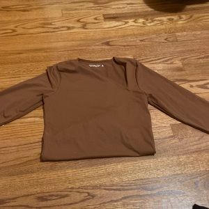 Brown Abercrombie and fitch body suit with a slit at the the shoulder size M